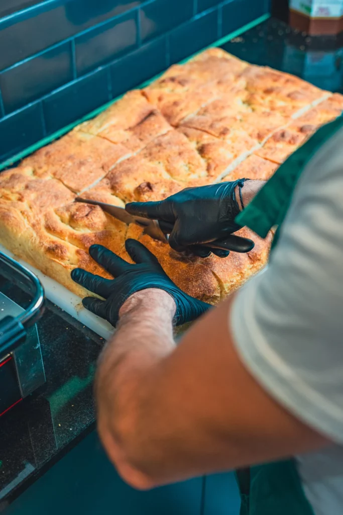 Cutting a focaccia at Fabiano
